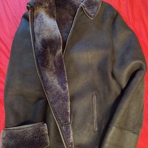 New Men Black Sheep Coat.
Leather and fur.
